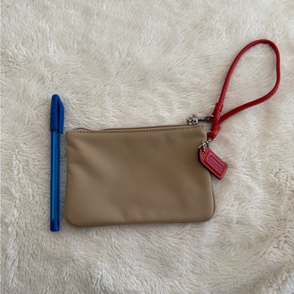 Coach Tan Wristlet with Red Accents - Picture 2 of 3
